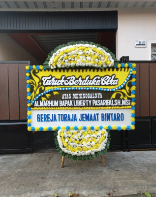Papan Bunga Duka di Kampung Pondok